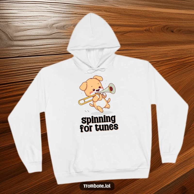 Funny hoodie graphic of a playful puppy chasing its tail, humorously interacting with the slide of a trombone.